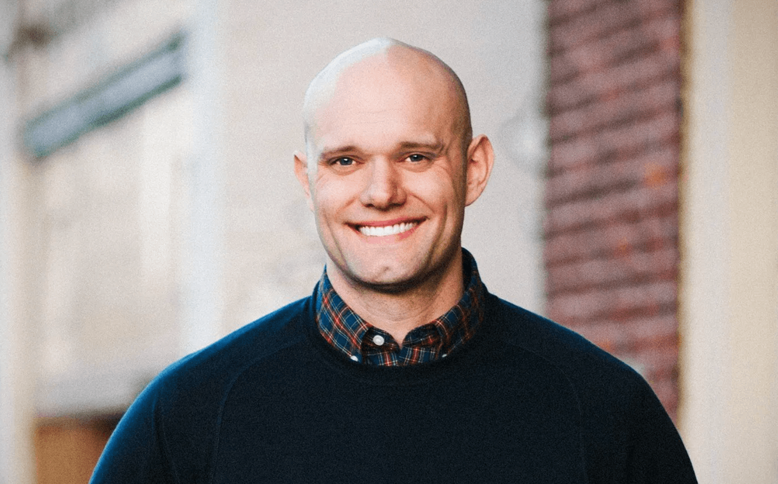 James Clear smiling. 4 Principles to healthy habits