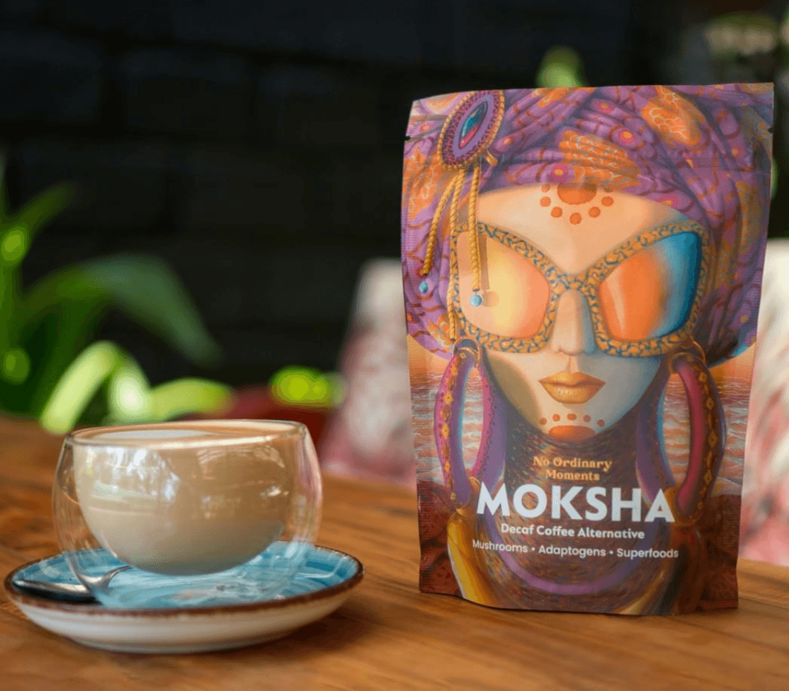 Moksha coffee with a cup of moksha coffe next to the package