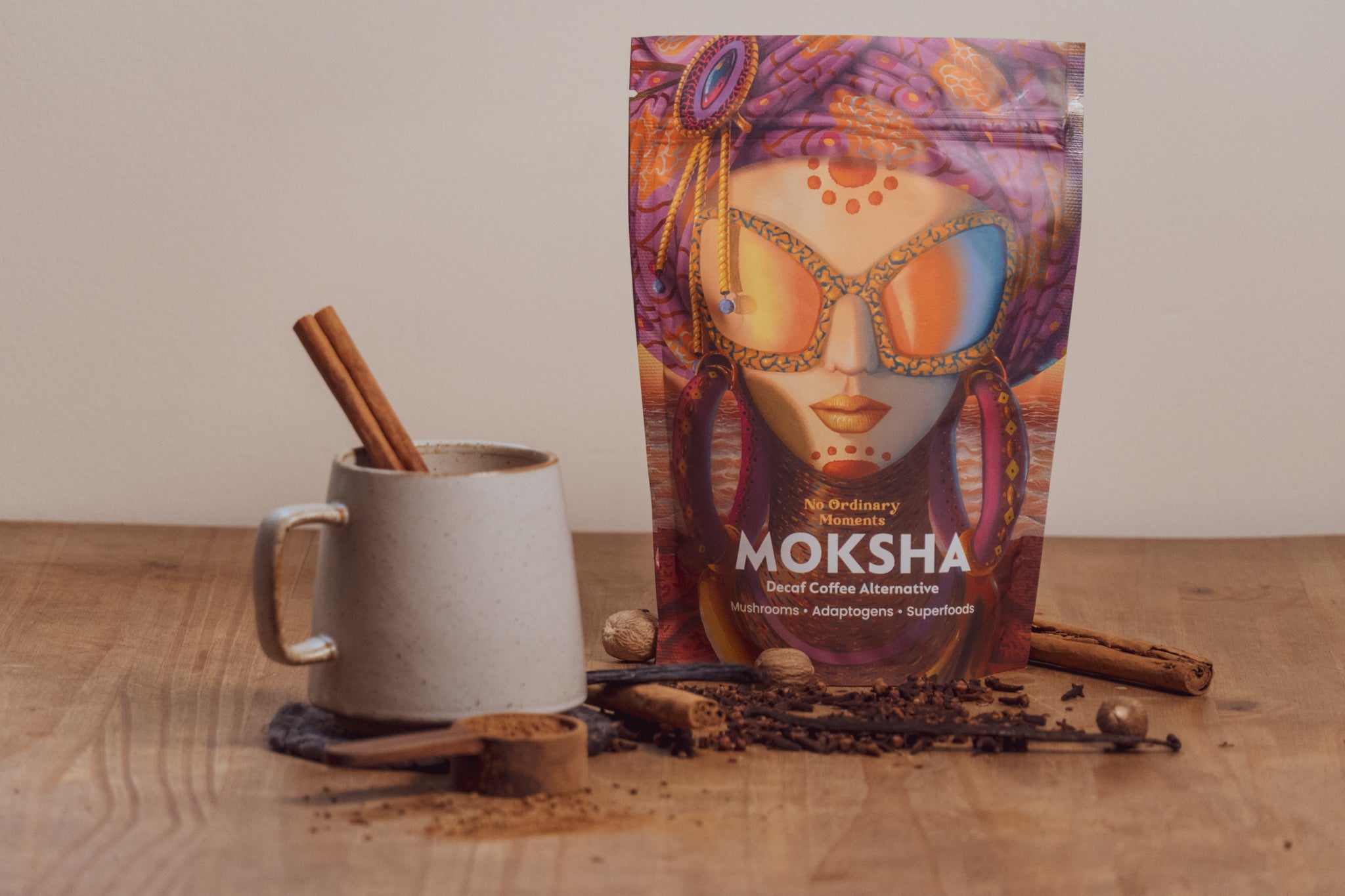 Moksha Decaf Coffee Alternative in front of coffee mug 
