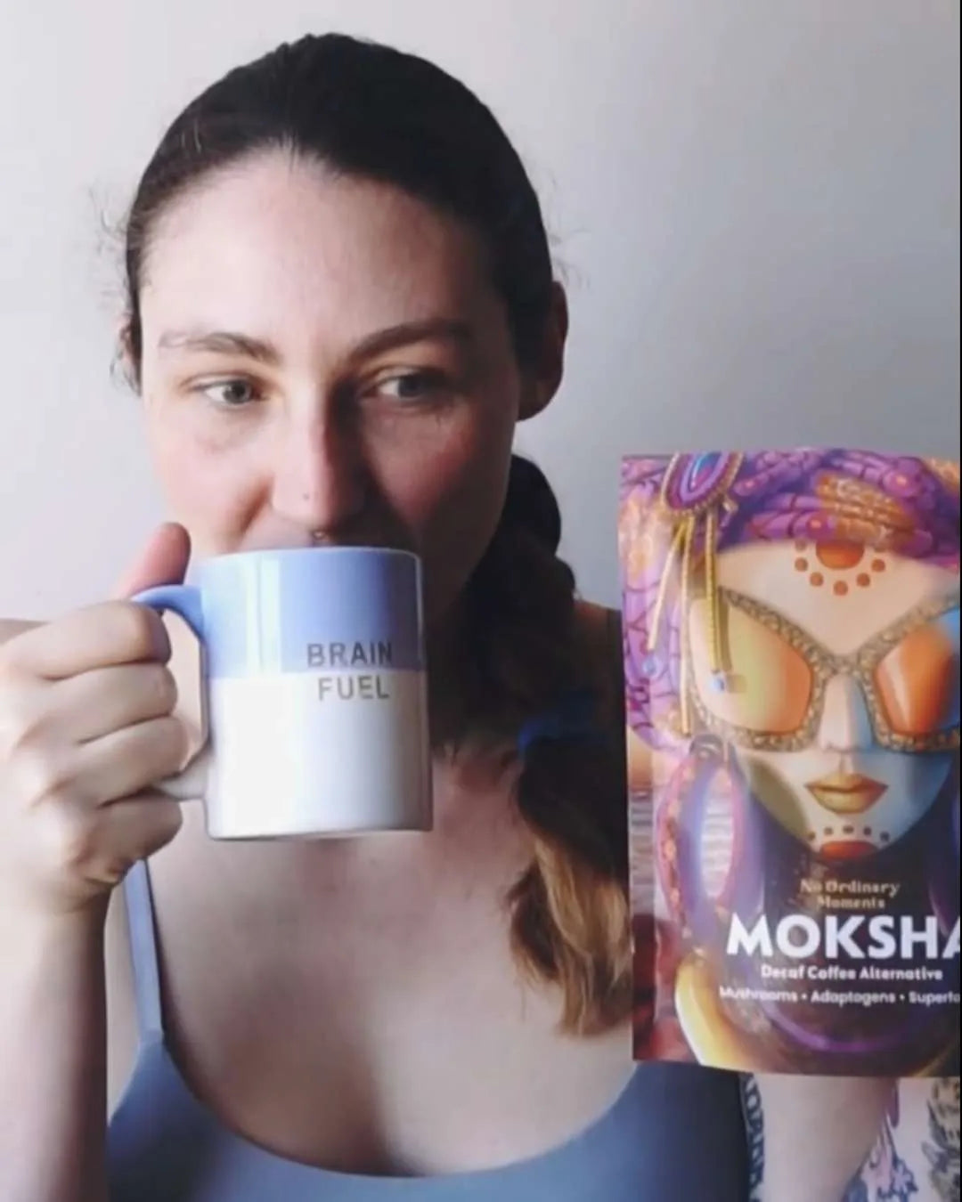 Customer holding Moksha