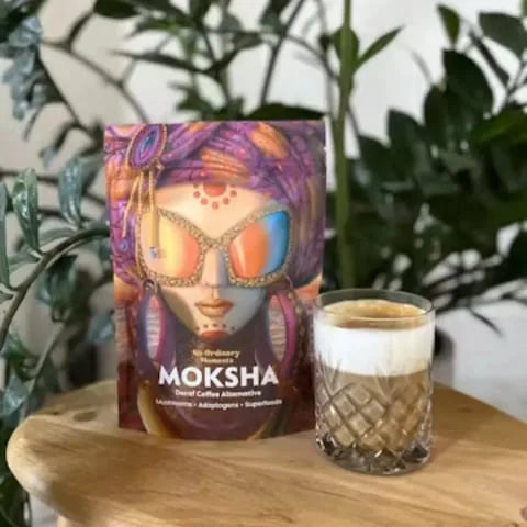 Moksha held among houseplants